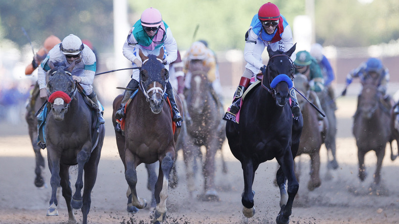 Horse racers at the Kentucky Derby 