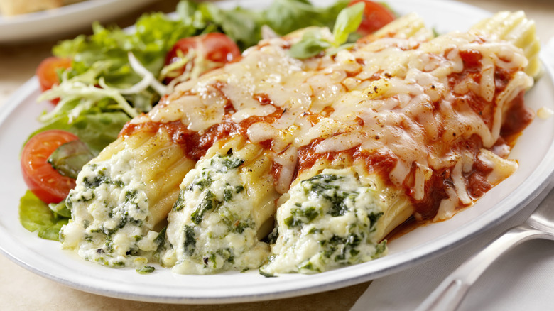 Homemade manicotti with ricotta and spinach