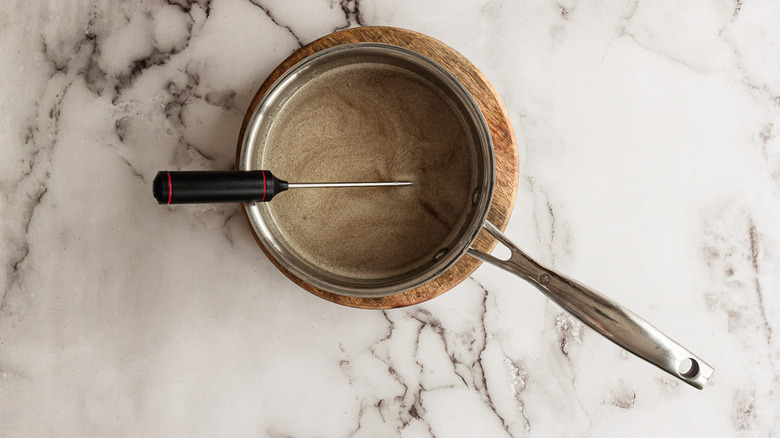 Thermometer in saucepan