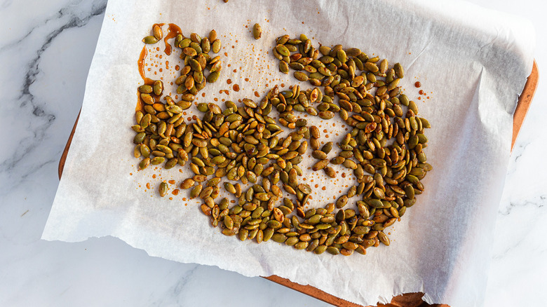 Baked maple seeds on baking sheet