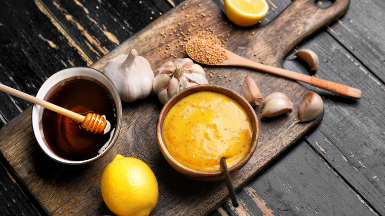 Ingredients to make a maple syrup-mustard sauce