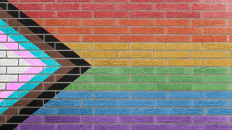 Progress pride flag on brick