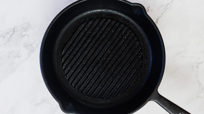 Preheated cast iron pan