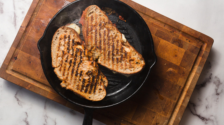 Cooked grilled cheese in pan