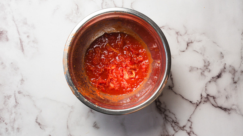 Crushed tomatoes in bowl