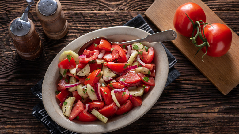 Tomatoes with cucumbers and onions