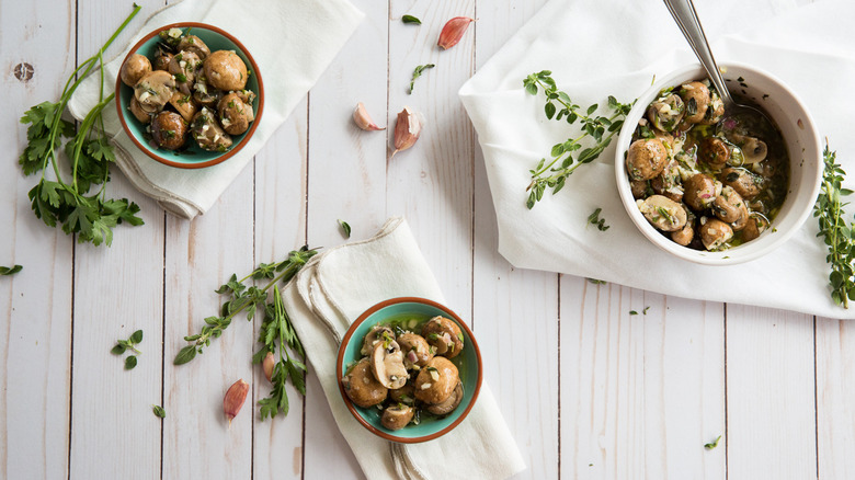 marinated mushrooms served on table