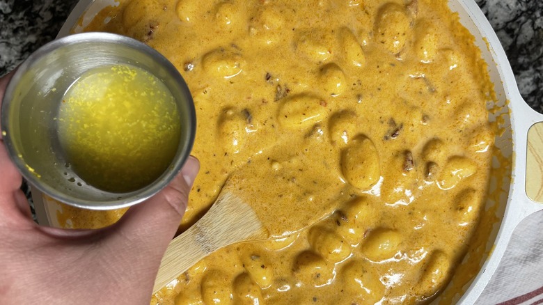 lemon juice going into gnocchi