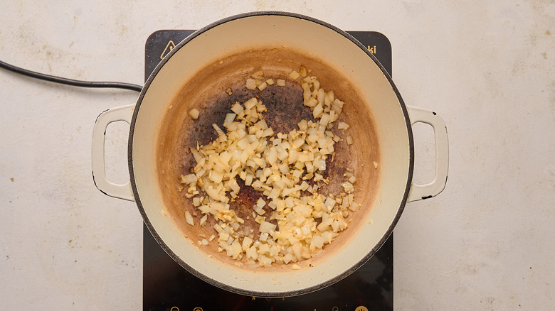 Onion cooking in a Dutch oven