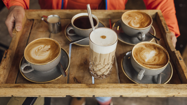 tray of different fall coffee drinks