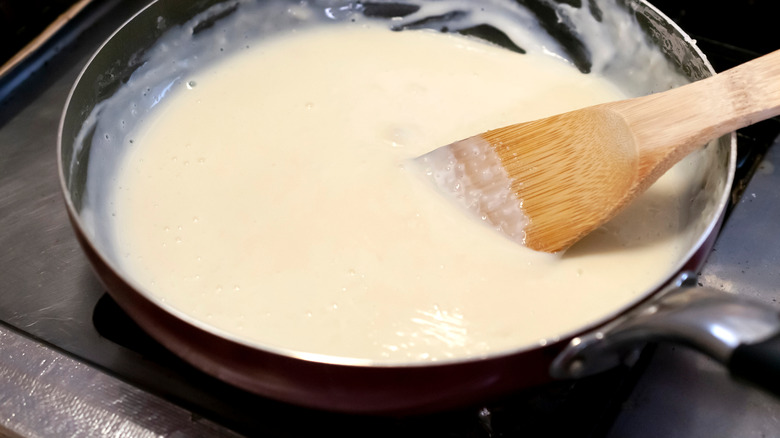 Béchamel sauce in saucepan