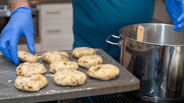 Crab cakes being prepared to fry