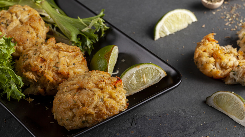 Plated Maryland crab cakes with citrus