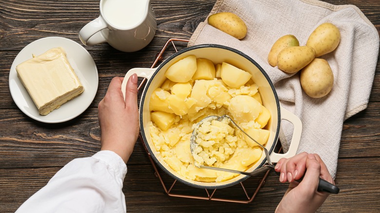 Mashing potatoes