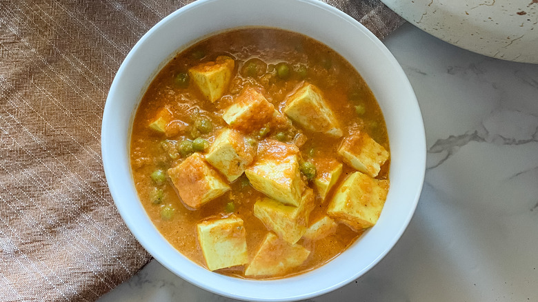 matar paneer in bowls