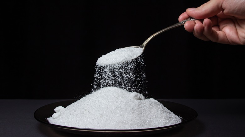 Salt pouring from spoon