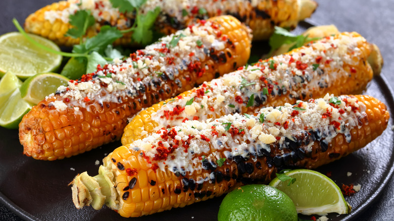 Elotes with cotija and garnishes