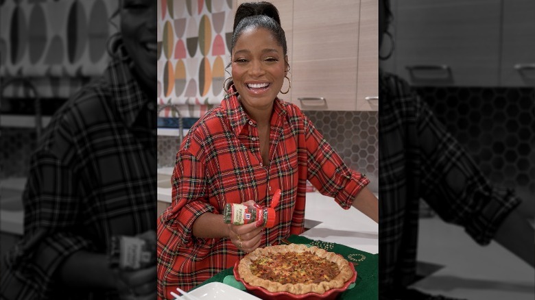 Keke Palmer adding McCormick spice to dish