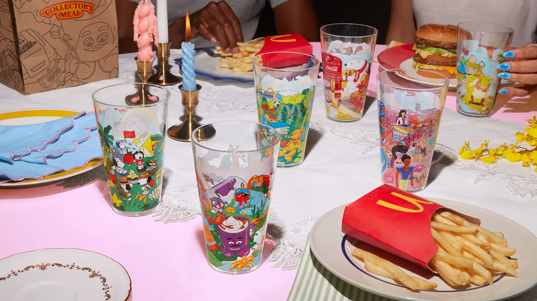 Decorative cups on table with food