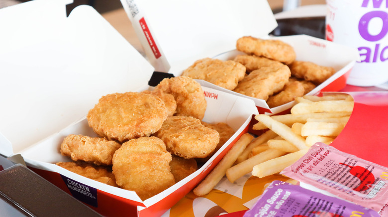 Chicken McNuggets and fries on table