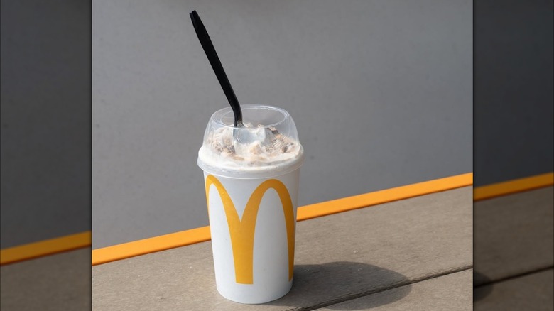 A McDonald's Kit Kat McFlurry with a black spoon