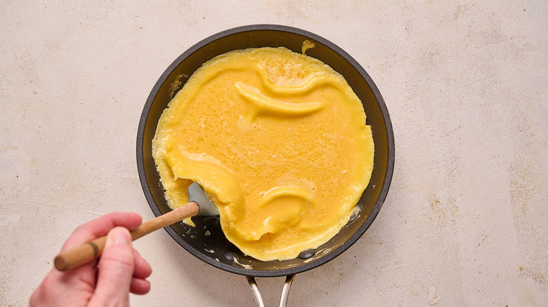 cooking eggs in a skillet