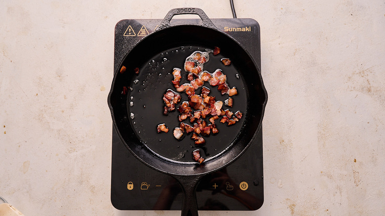 cooking bacon in skillet