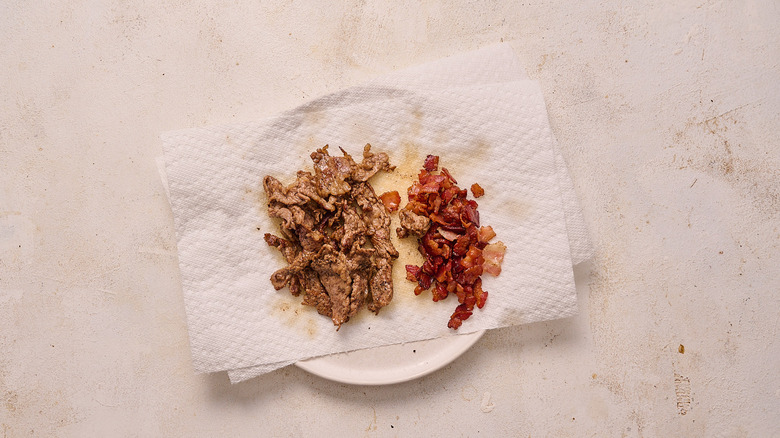 steak and bacon on paper towel