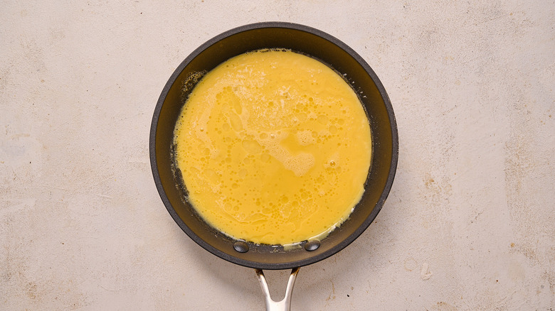 cooking eggs in a skillet