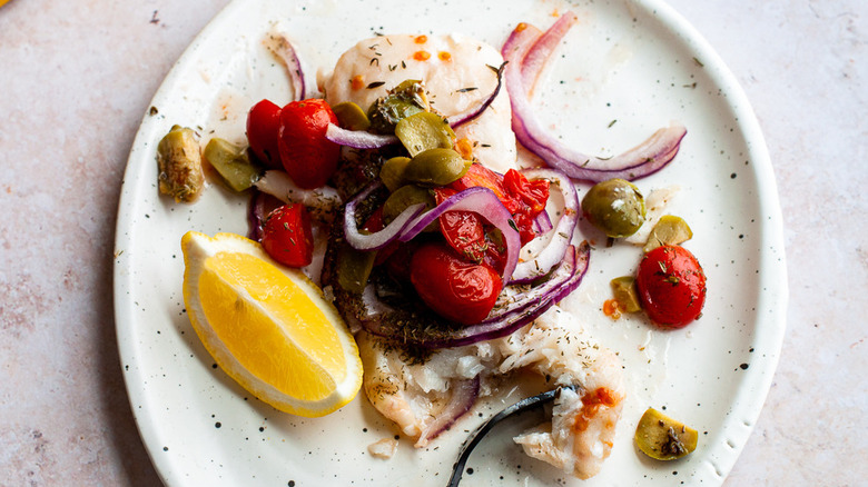 cod and vegetables on plate