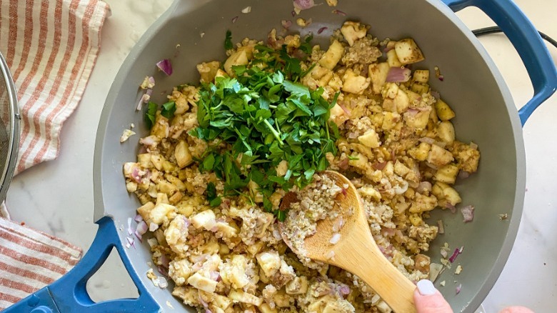 eggplant and ingredients in pan