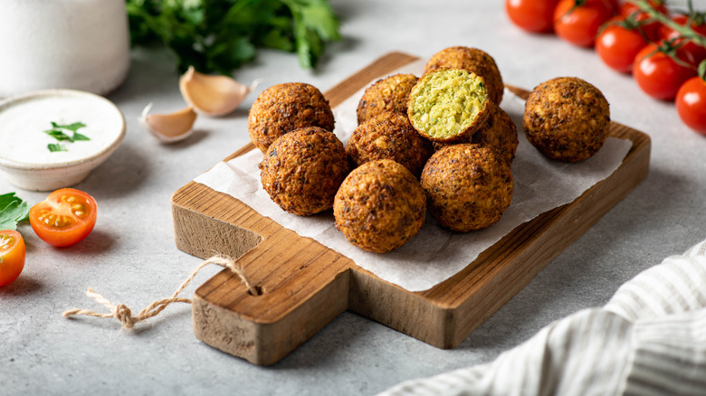 Falafel on wooden platter