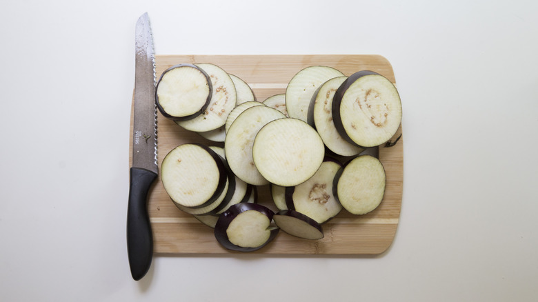 sliced eggplant rounds on board