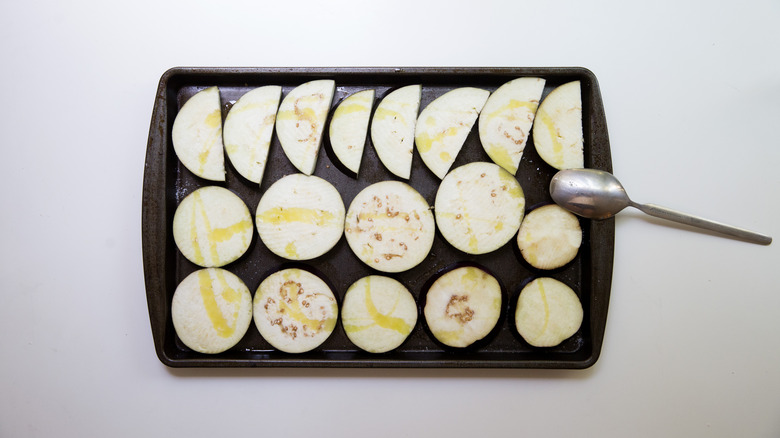 eggplant slices on baking sheet