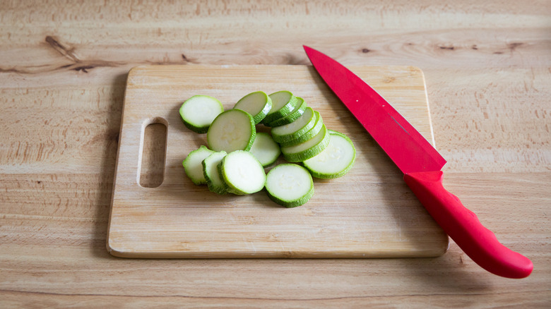 sliced zucchini on cutting board