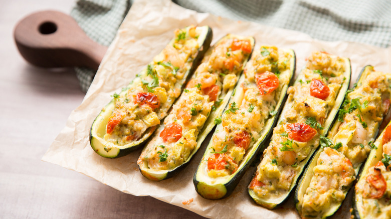 shrimp-stuffed zucchini boats on board 