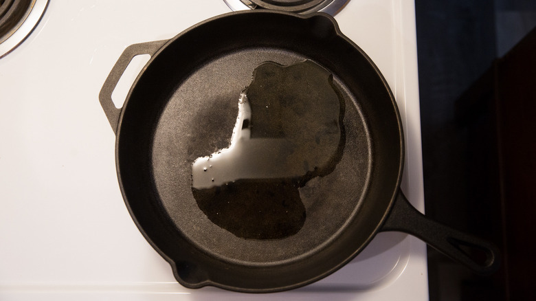 oil heating in iron pan 