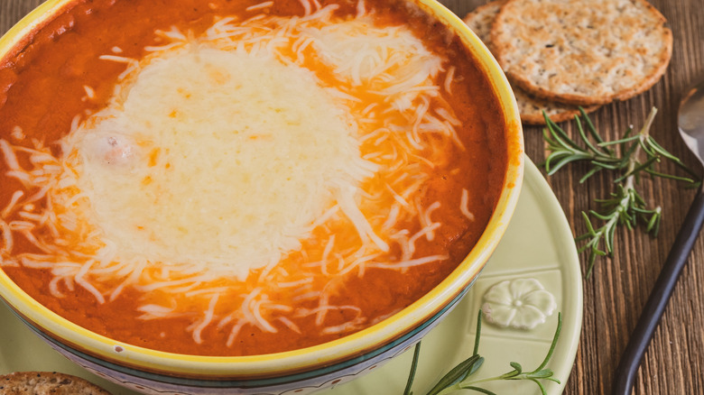 Roasted tomato soup topped with cheese