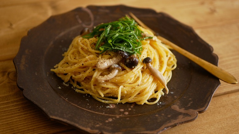 Pasta dish with mentaiko olives and herbs 