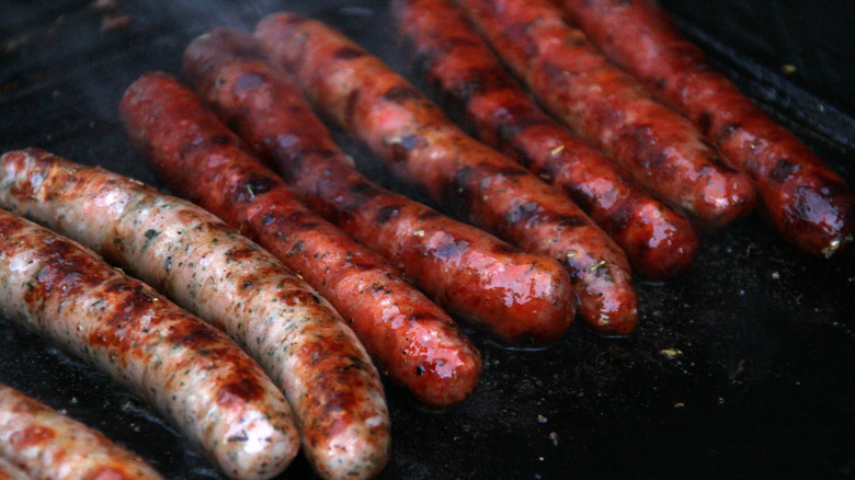 merguez sausages on a grill