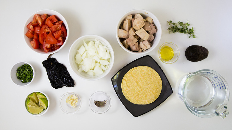 Mexican soup ingredients on table