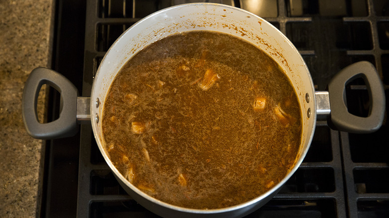 Mexican tortilla soup in pot