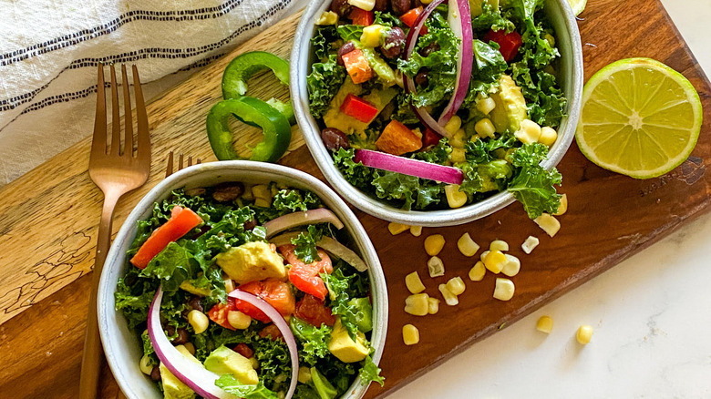 mexican kale salad in bowls