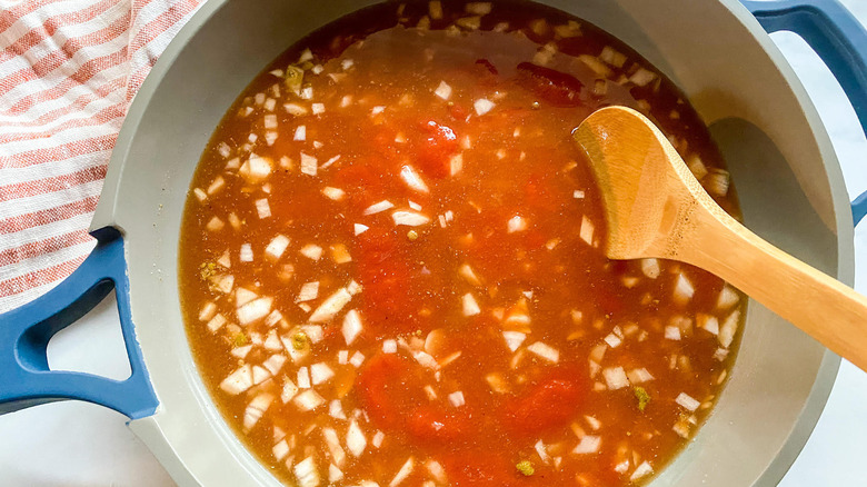 mexican rice ingredients in skillet 