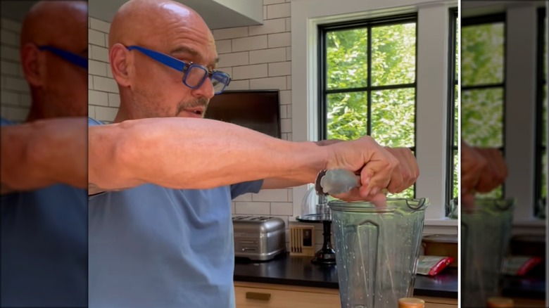 juicing lime with tongs