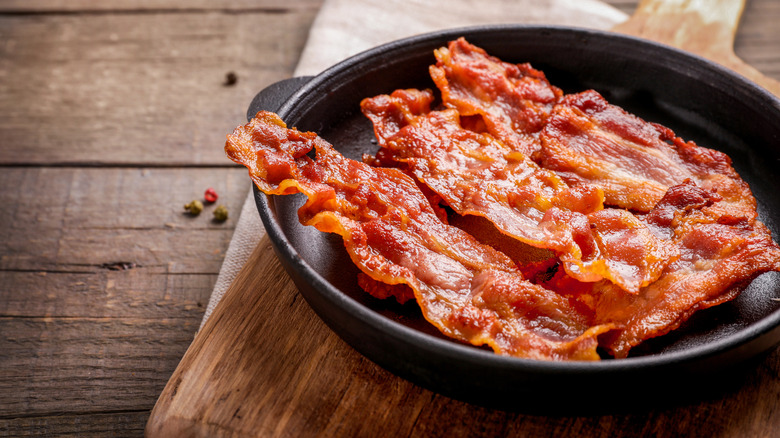 Bacon strips in a skillet