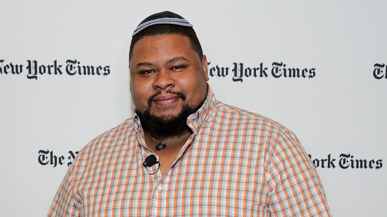 Michael W. Twitty smiling at event