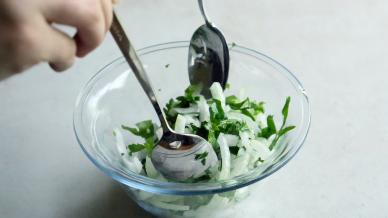 onion parsley salad in bowl