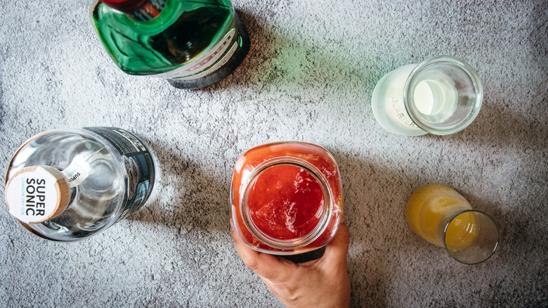 Negroni in jar with ingredients