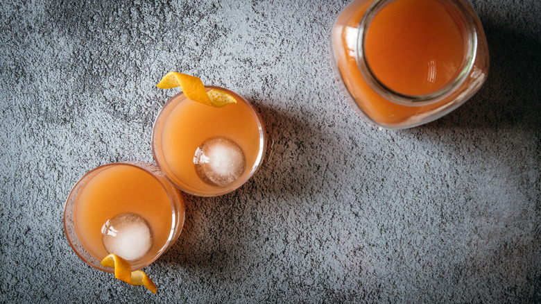 Two Negroni glasses and jar